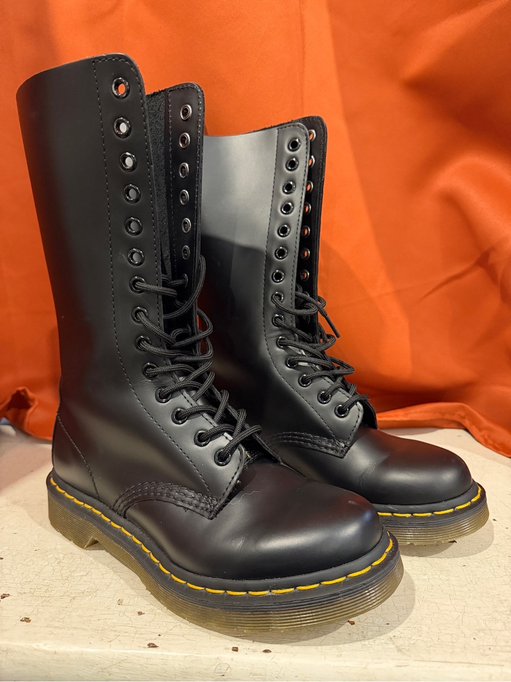 Dr. Martens Black 14-Eye Tall Leather Combat Boots with Yellow Welt Stitching